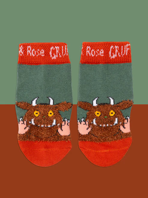 Pair of socks with the Gruffalo on a brown background
