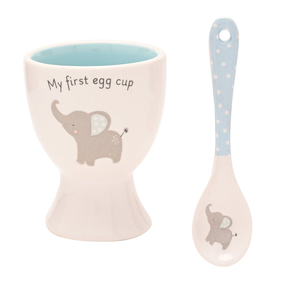 Egg cup and spoon set with elephant design on a white background